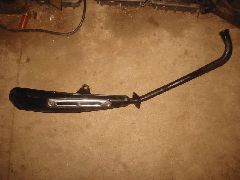 Wire brushed the muffler, put in new baffle and painted it black.