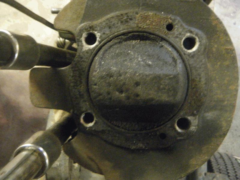 Head off, pits in piston