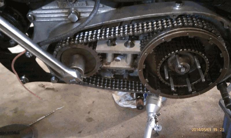 Removing Crankshaft bolt with home made lock tool.