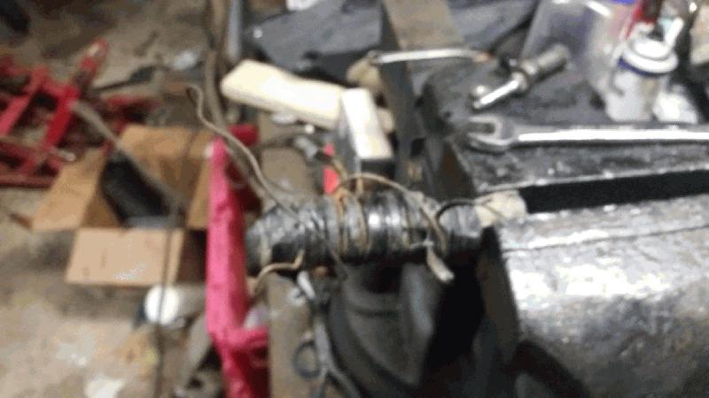 Coat hanger and rubber removed.
