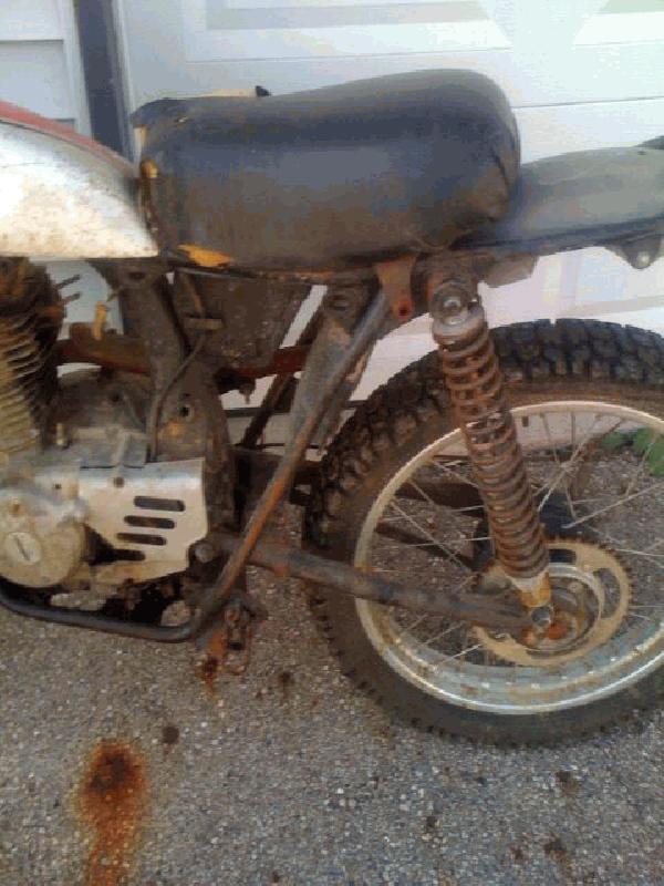 Missing just about everything, rear rim is not original and the shocks are wrong also.