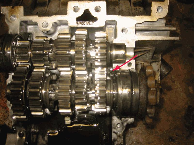 Engine split easily, hellow, what is the spring at end of red arrow and where did it come from?