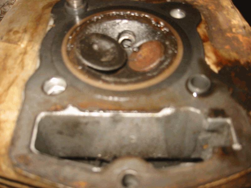 Engine had no compression, and here's why, bent valve. I was well aware of this problem due to my bikes back in the 70's (sl125) bending valves...