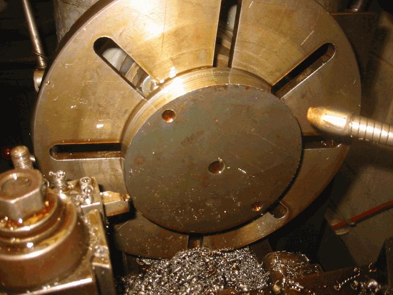 Turning it on a faceplate with threaded holes as tie down.