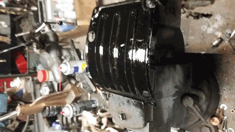 Skid plate degraded and painted.
