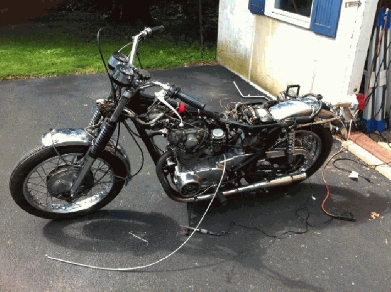 More parts removed, notice I now have the stock fork tubes on.