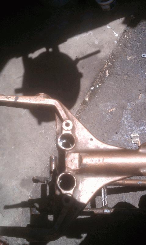 Repairing Frame seat Tubes, they were welded. Needed to bore new hole for spring.