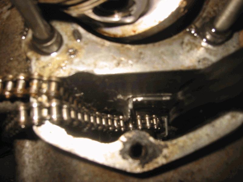 A lot of aluminum was worn away by the chain slapping around... I always thought this was a bad design..