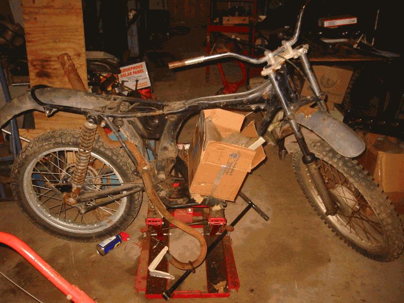 Engine off, parts put in the frame for storage.