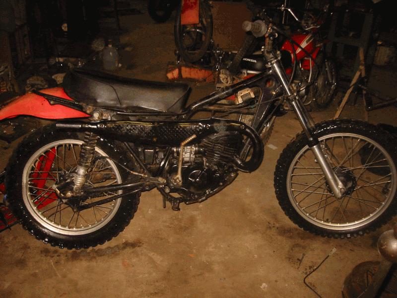 Cleaned up a bit, muffler painted. Rear Brake Adjusted.