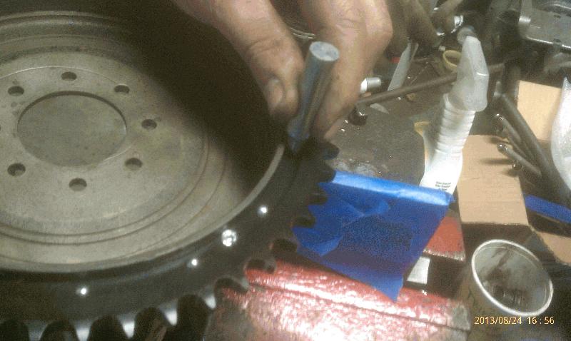 Putting in Drum Sprocket Rivets.