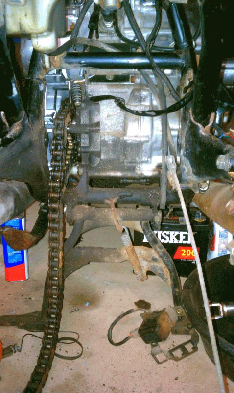 Tire off, lots of grease to remove.