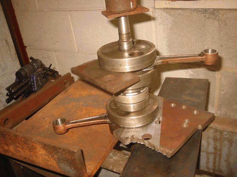 Notice pieces of surface ground metal to stop cranks from squeezing together