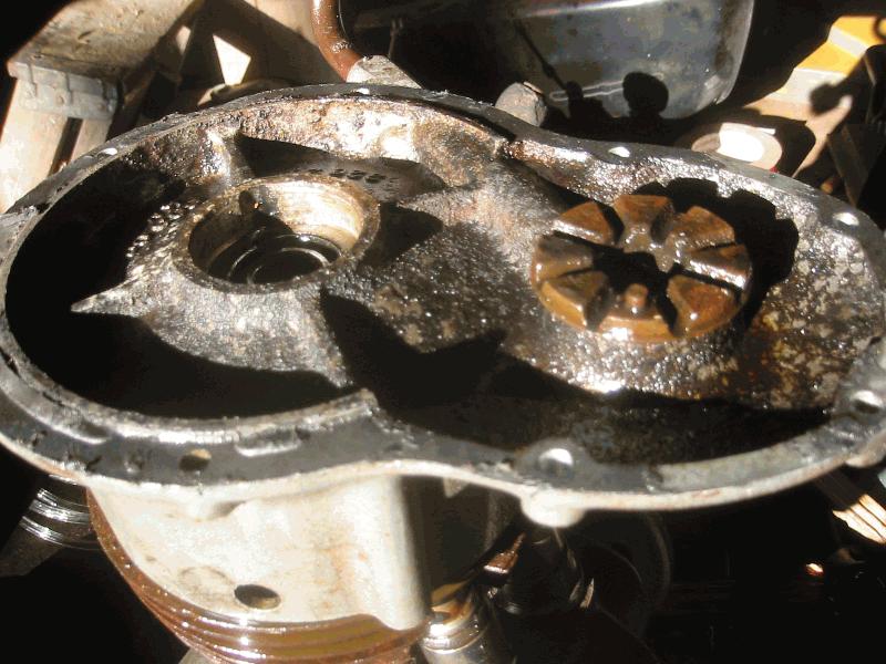 Cover has points piece with slots which is stuck tight in cover, more penetrating oil....